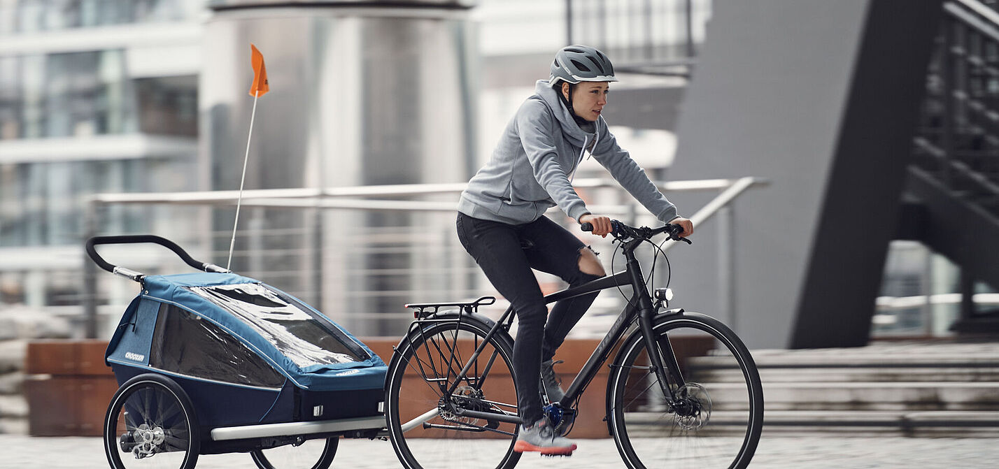 In Kinderfahrradanhängern lassen sich ein bis zwei Kinder sicher transportieren. In Kinderfahrradanhängern lassen sich ein bis zwei Kinder sicher transportieren.
